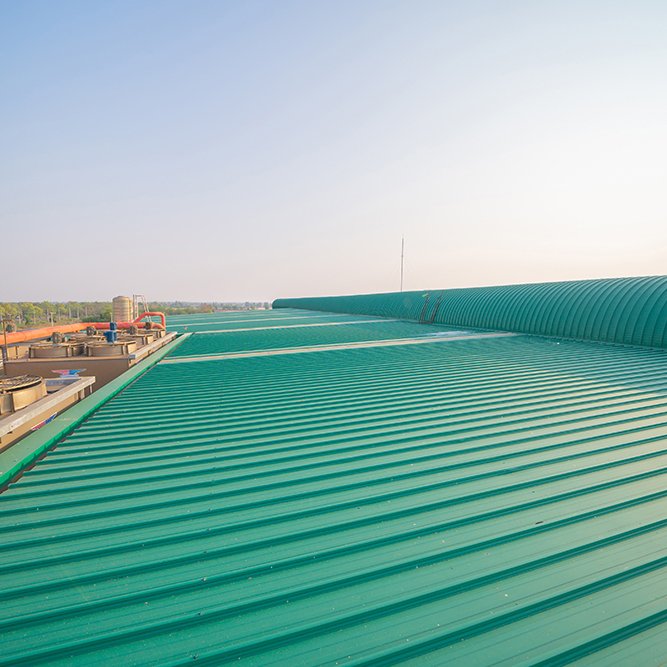 Empty space of metal sheet corrugated roof on rooftop of industry factory. Steel structure of modern station building roof. Metal. architecture design background.