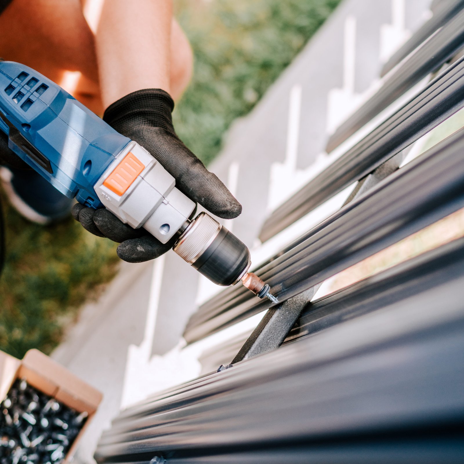 close up details of electrical screwdriver fastening screws on c