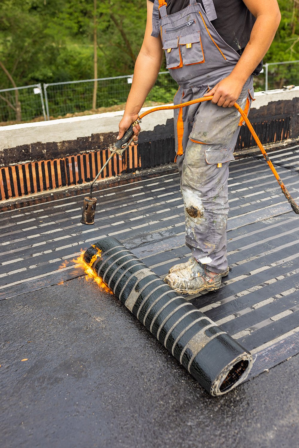 flat roofing installation crew
